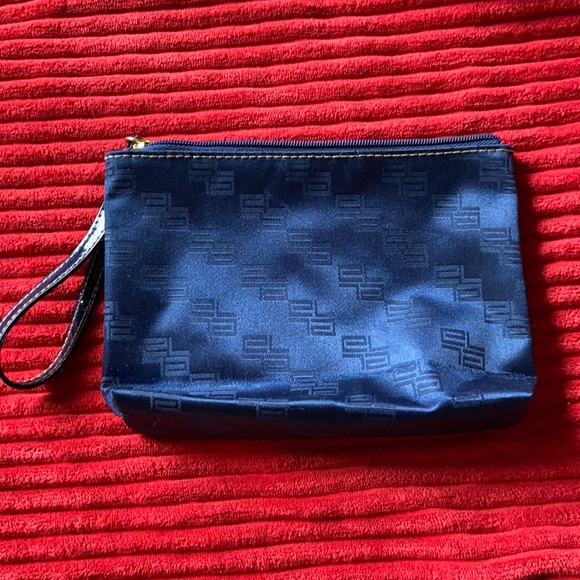 Navy blue zip top with wristlet handle - Picture 1 of 3